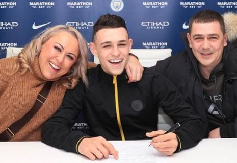 Phil Foden Snr with his wife Claire Foden and son Phil Foden.